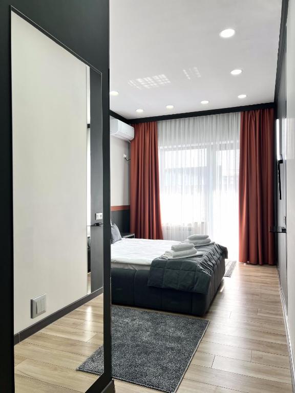 Postel nebo postele na pokoji v ubytování Suncor Hotel