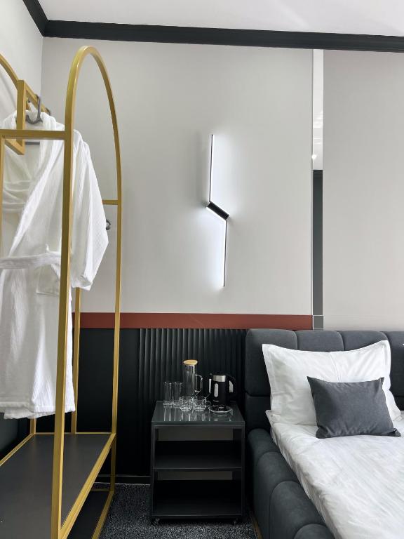 Postel nebo postele na pokoji v ubytování Suncor Hotel