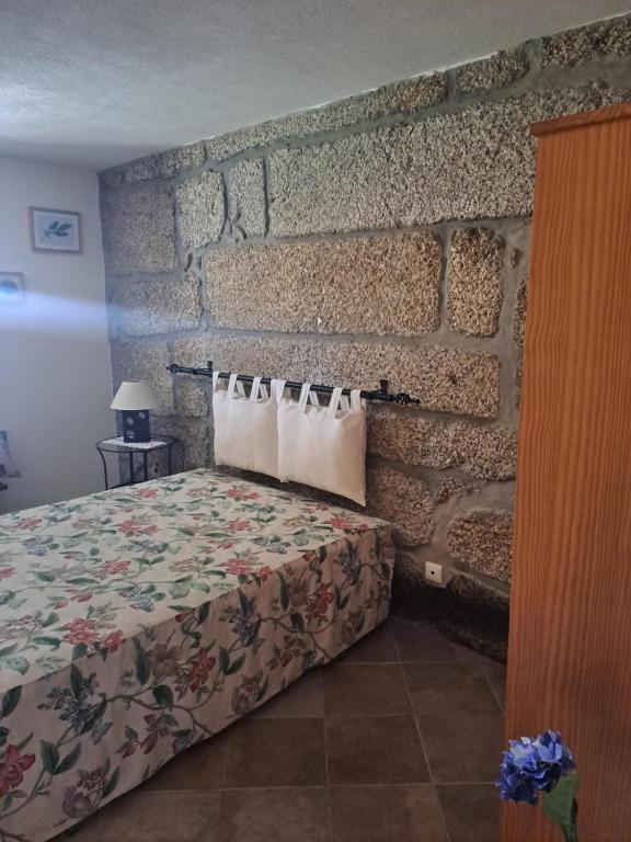 Postel nebo postele na pokoji v ubytování Quinta Do Quetrofe