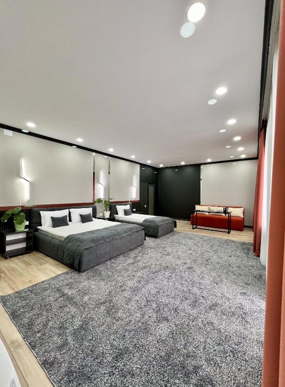 Postel nebo postele na pokoji v ubytování Suncor Hotel
