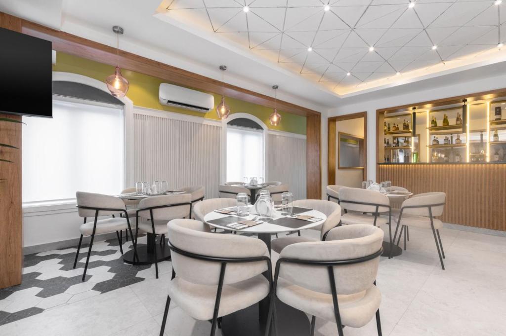 TV a/nebo společenská místnost v ubytování Ivy Lush Hotel