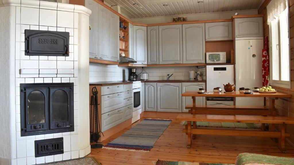 Kuchyň nebo kuchyňský kout v ubytování Villa North Karelia by offerhut 25