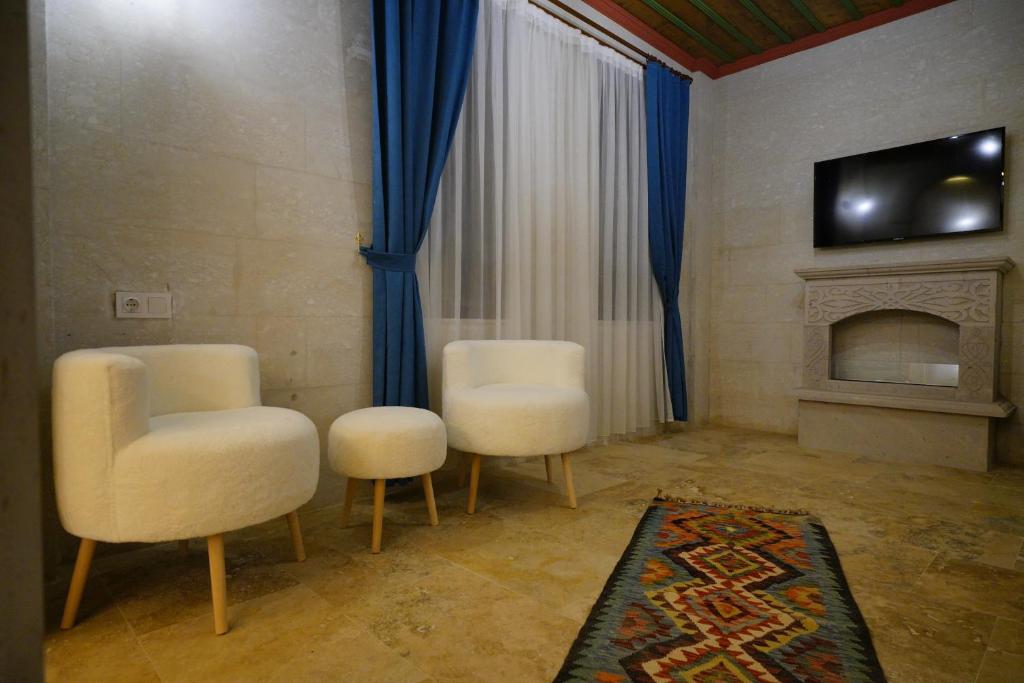 TV a/nebo společenská místnost v ubytování Mayda Cappadocia