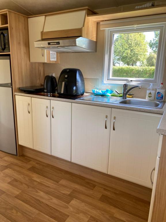 Kuchyň nebo kuchyňský kout v ubytování B&B De Turfsteker
