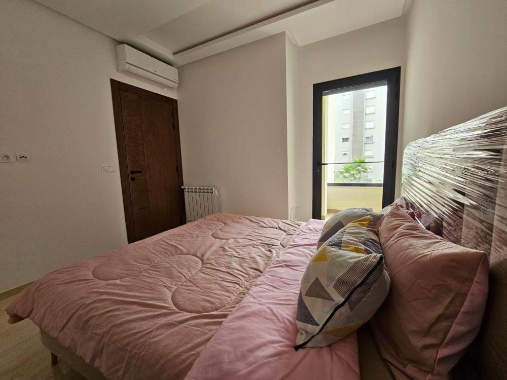 Postel nebo postele na pokoji v ubytování Des appartements a louer
