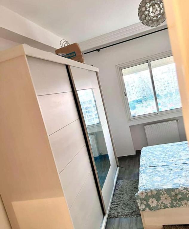 Postel nebo postele na pokoji v ubytování Des appartements a louer