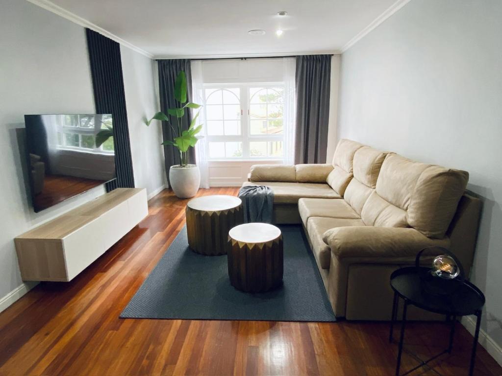 A seating area at Piso Céntrico 120m2 + parking propio (O Grove)