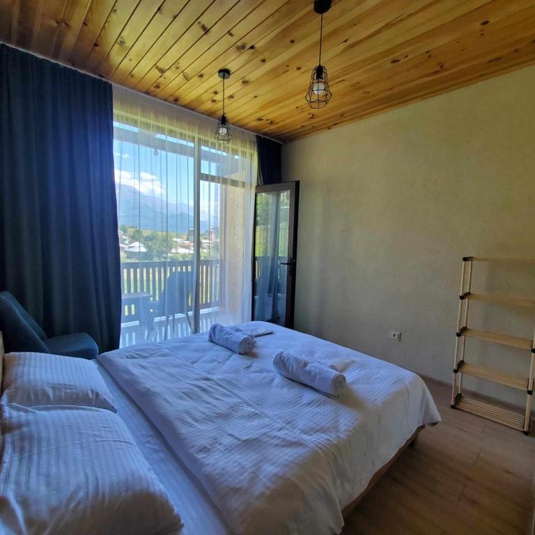 Postel nebo postele na pokoji v ubytování Eco Garden Svaneti