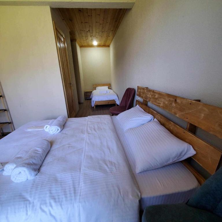 Postel nebo postele na pokoji v ubytování Eco Garden Svaneti