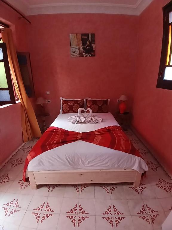 Postel nebo postele na pokoji v ubytování Riad Dantella