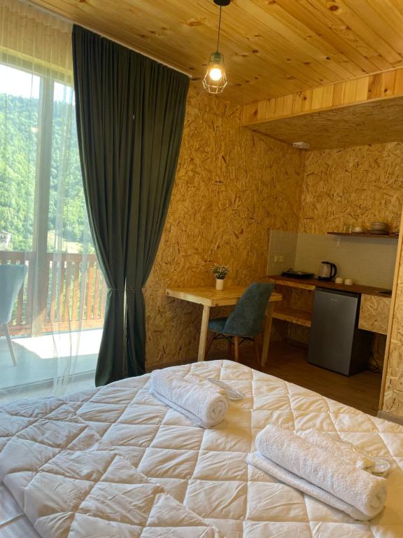 Postel nebo postele na pokoji v ubytování Eco Garden Svaneti