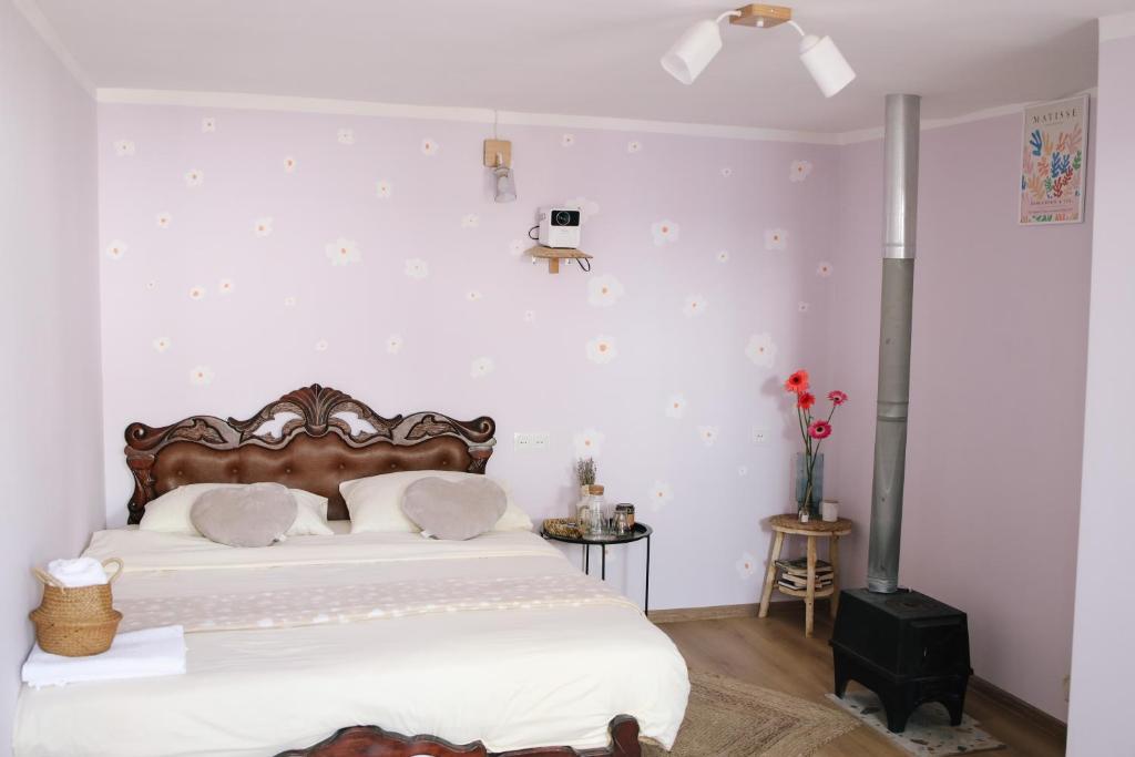 Postel nebo postele na pokoji v ubytování Buna Guest House
