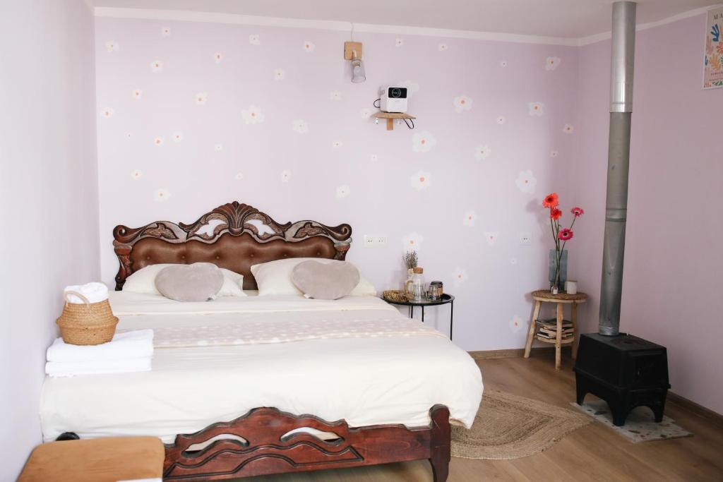 Postel nebo postele na pokoji v ubytování Buna Guest House