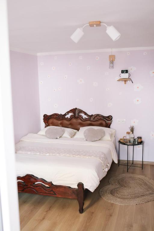 Postel nebo postele na pokoji v ubytování Buna Guest House
