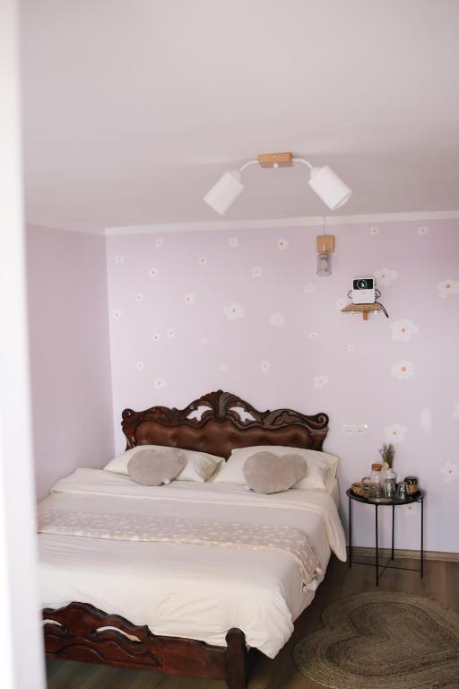 Postel nebo postele na pokoji v ubytování Buna Guest House