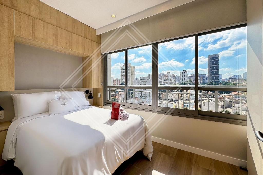 Postel nebo postele na pokoji v ubytování Zainalofts7Vila Mariana ao lado metrô, CASV 64 ID