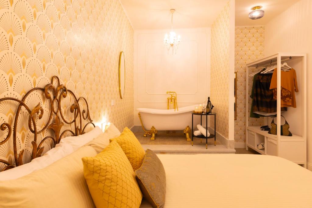 Postel nebo postele na pokoji v ubytování Casa dei Liuti Luxury GuestHouse