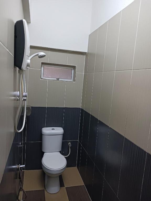 Koupelna v ubytování Casavilla Hotel