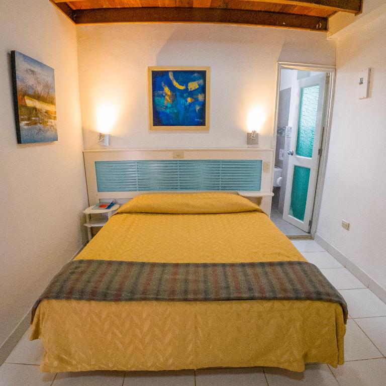 Postel nebo postele na pokoji v ubytování La Casa de Marita