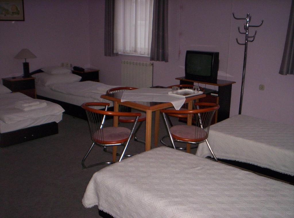 Postel nebo postele na pokoji v ubytování Apollo Motel