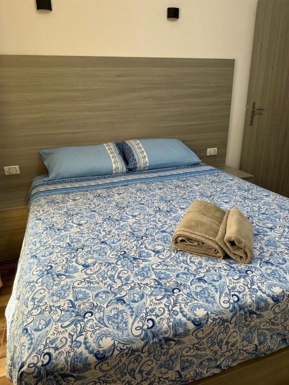Postel nebo postele na pokoji v ubytování Camelgila Appartment Royal Residence