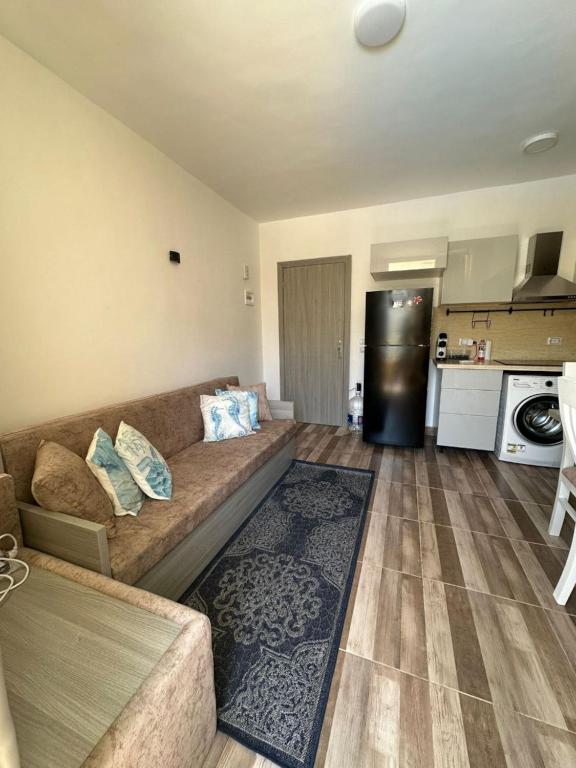 Kuchyň nebo kuchyňský kout v ubytování Camelgila Appartment Royal Residence