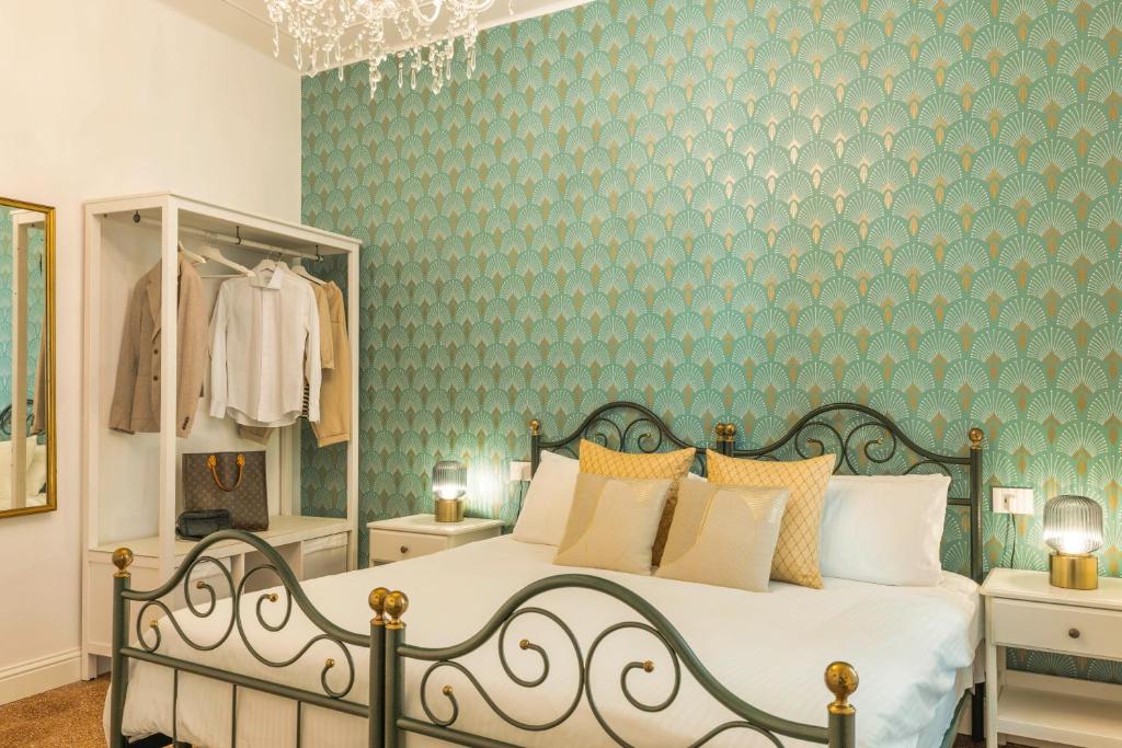 Postel nebo postele na pokoji v ubytování Casa dei Liuti Luxury GuestHouse