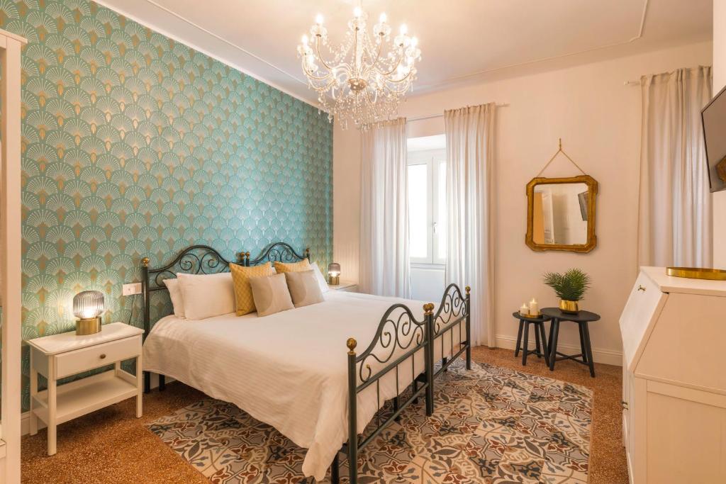 Postel nebo postele na pokoji v ubytování Casa dei Liuti Luxury GuestHouse
