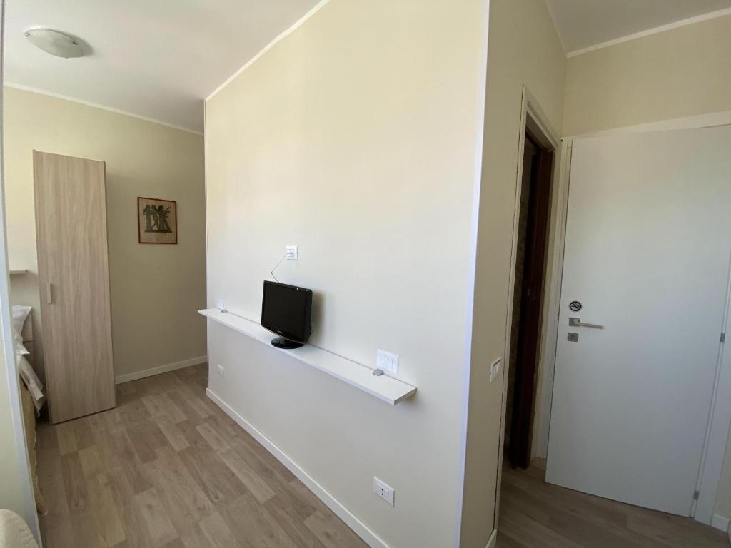 TV a/nebo společenská místnost v ubytování Albergo Lodrino