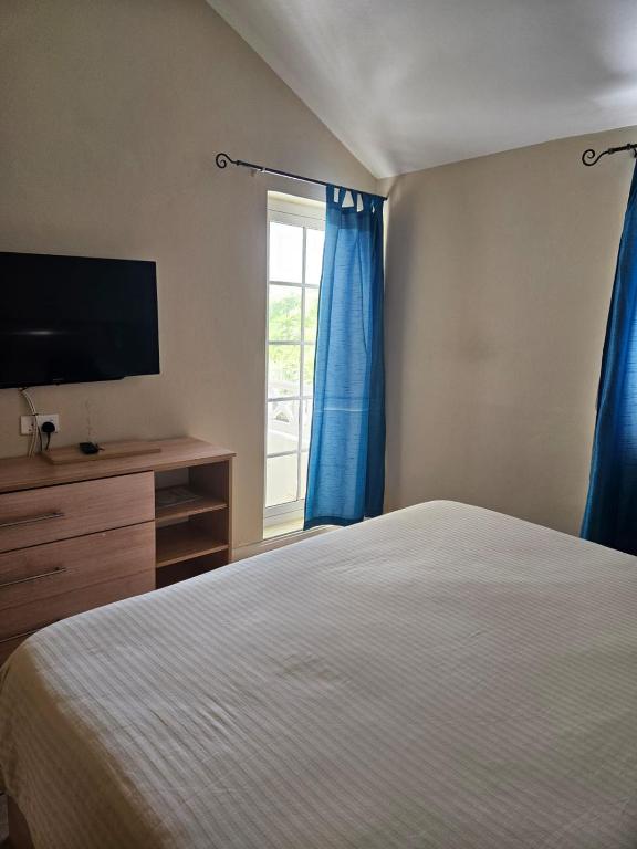 Postel nebo postele na pokoji v ubytování Villa No2 - Sun Tan Palmar