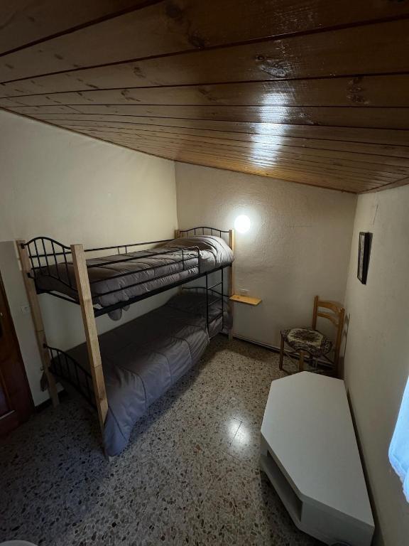 Postel nebo postele na pokoji v ubytování L Esquella Restaurante hostal