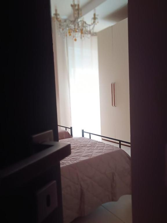 Postel nebo postele na pokoji v ubytování Le Comunicazioni