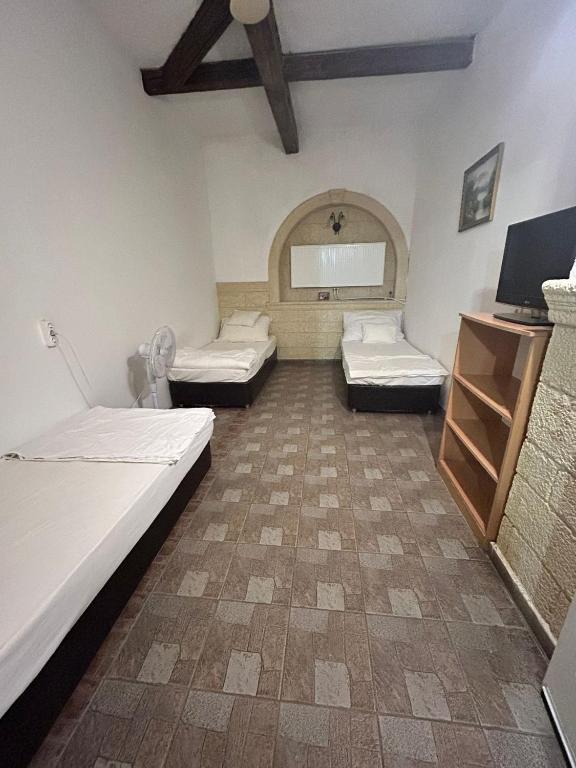 Postel nebo postele na pokoji v ubytování London Hostel
