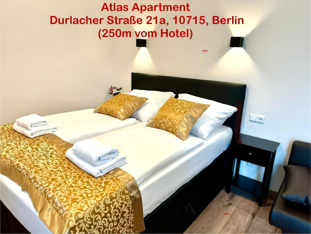 Postel nebo postele na pokoji v ubytování Atlas Berlin Hotel