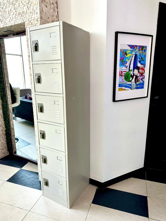 Ein Bett oder Betten in einem Zimmer der Unterkunft Ora Place JBR