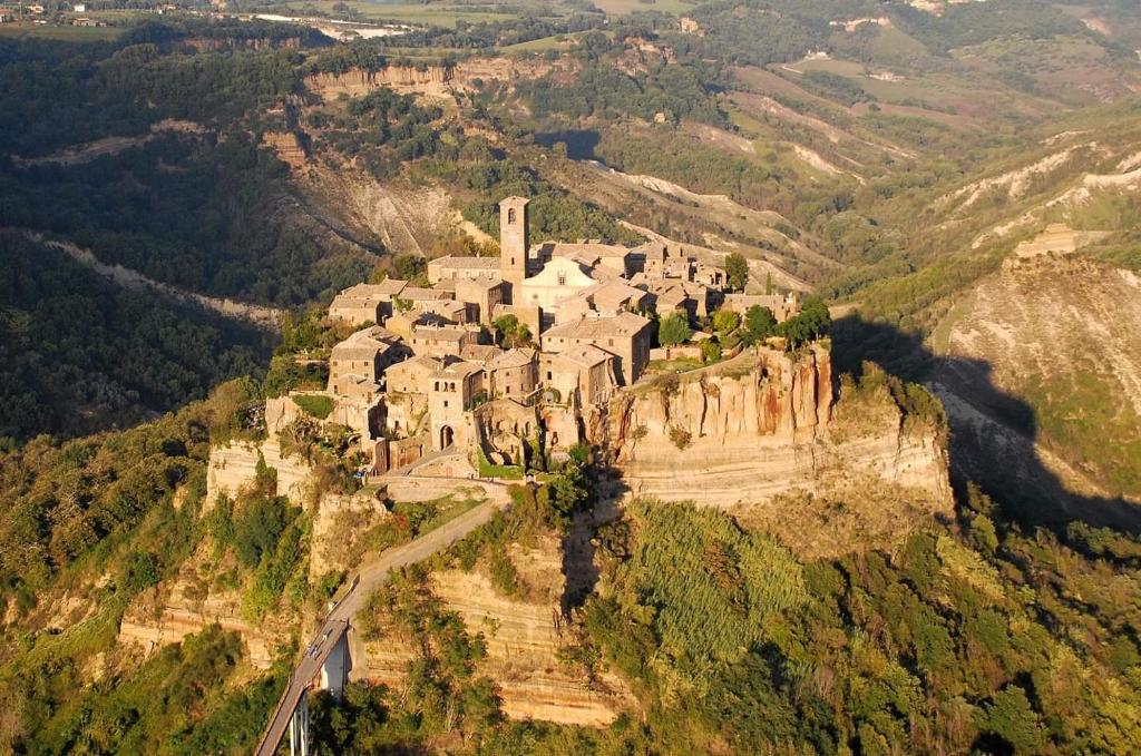 an old castle on top of a mountain at La Sosta in Bagnoregio