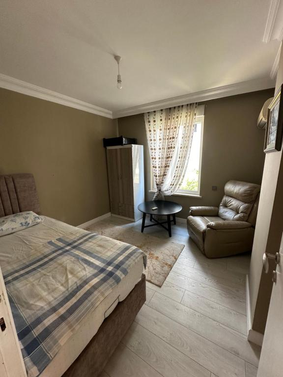 Postel nebo postele na pokoji v ubytování Nalbantoğlu Home