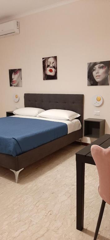 Posteľ alebo postele v izbe v ubytovaní Appartamento ALECATIA 2