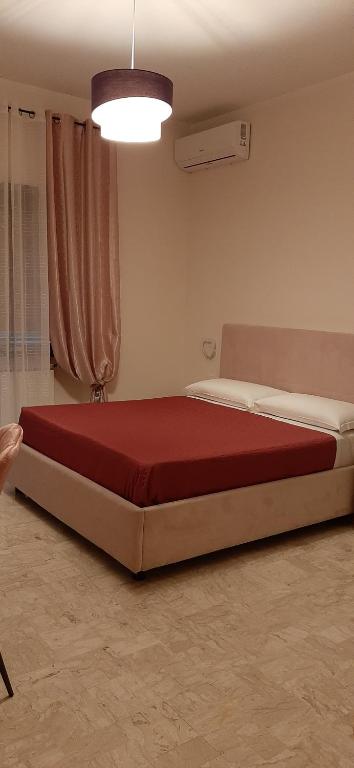 Posteľ alebo postele v izbe v ubytovaní Appartamento ALECATIA 2