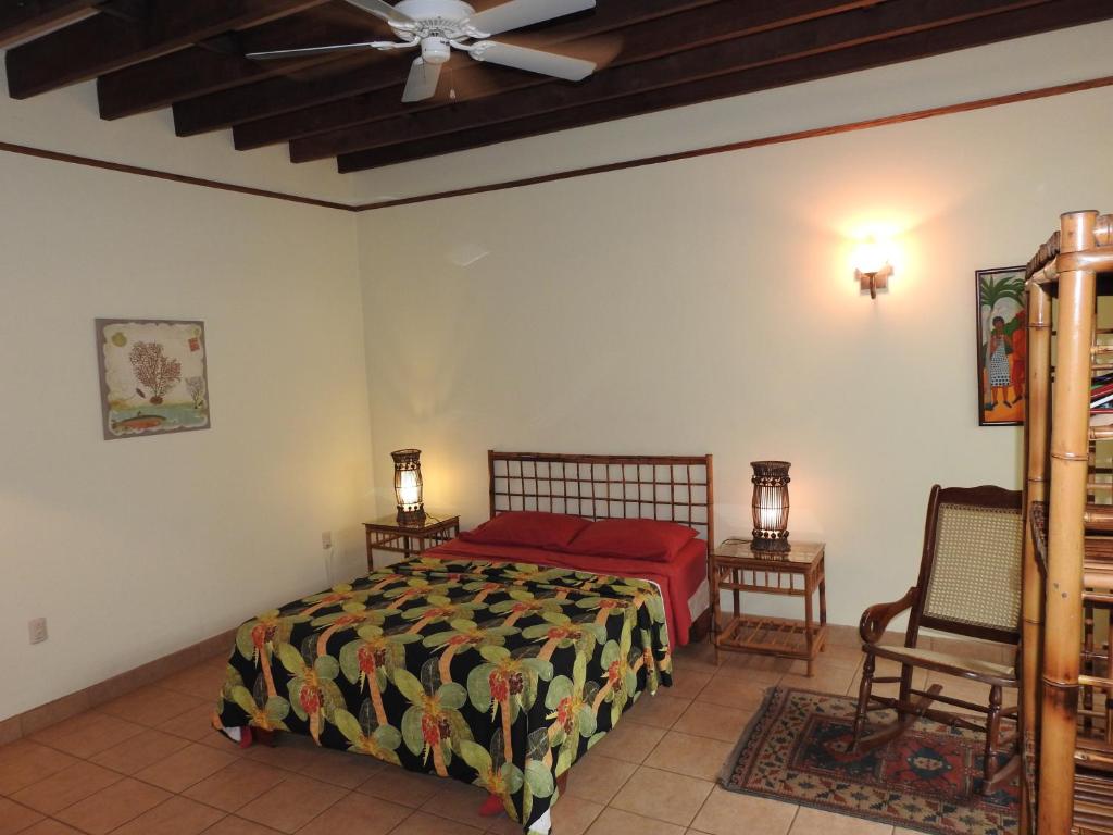Postel nebo postele na pokoji v ubytování Playa Negra Guesthouse