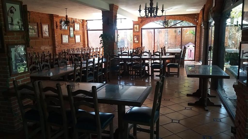 En restaurant eller et andet spisested på Campamento Hermoso Natural en Puebla