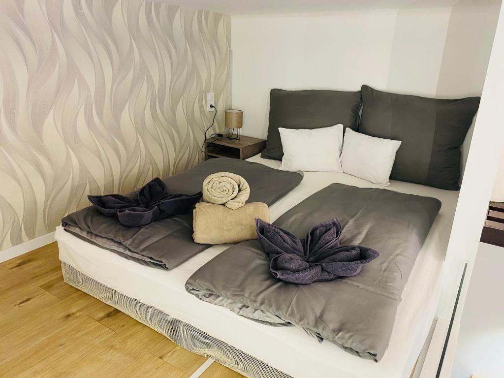 Ένα ή περισσότερα κρεβάτια σε δωμάτιο στο Panda Home