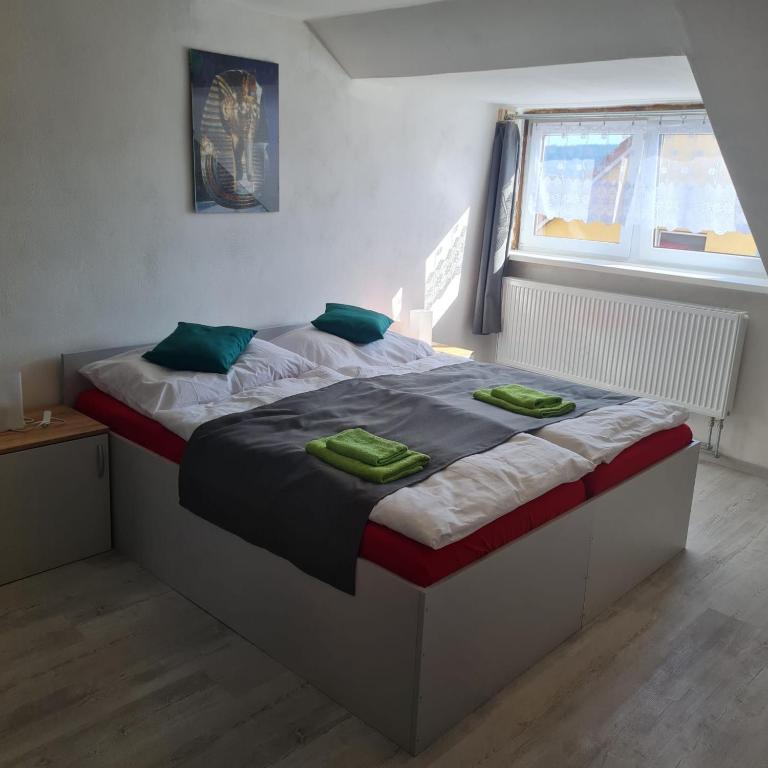 Postel nebo postele na pokoji v ubytování Hauptmann5