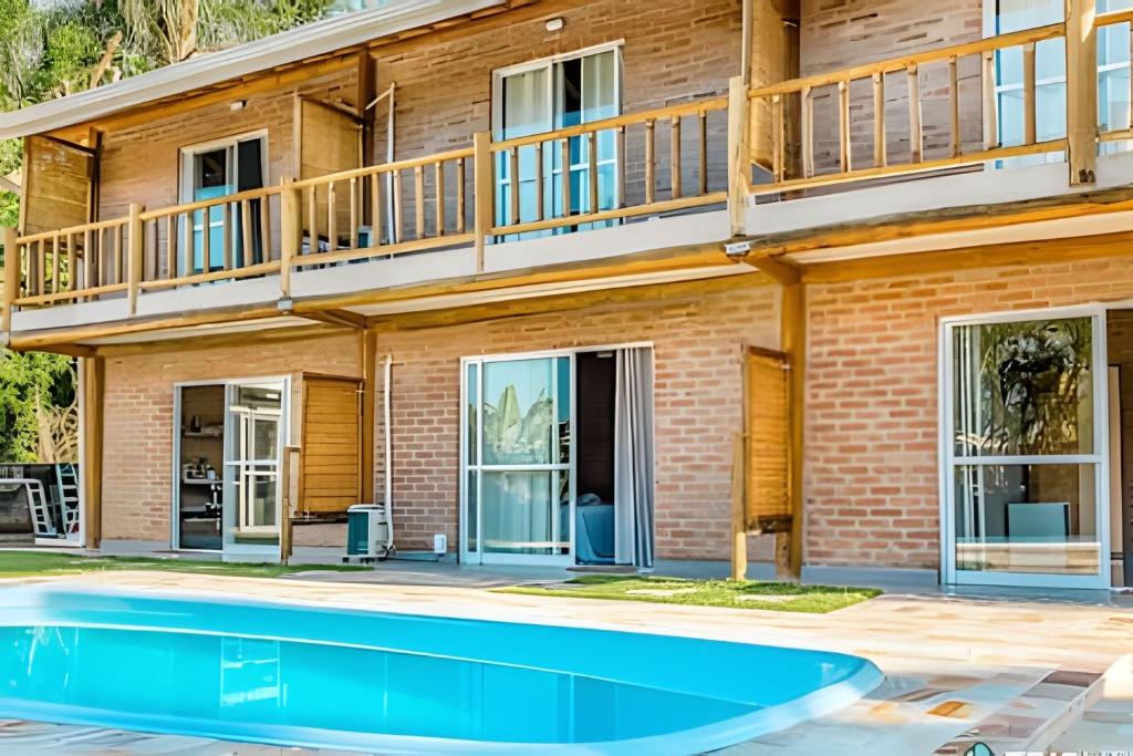 Bazén v ubytování Recanto da Feiticeira | Suítes incríveis com piscina nebo v jeho okolí