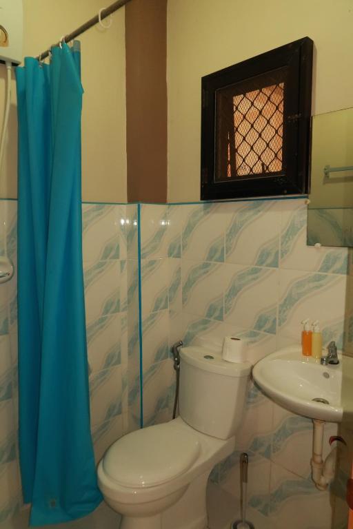 Koupelna v ubytování Jo-Cris Apartelle