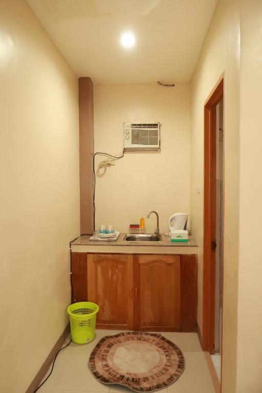 Kuchyň nebo kuchyňský kout v ubytování Jo-Cris Apartelle