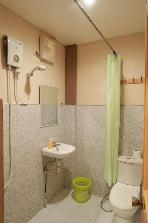 Koupelna v ubytování Jo-Cris Apartelle