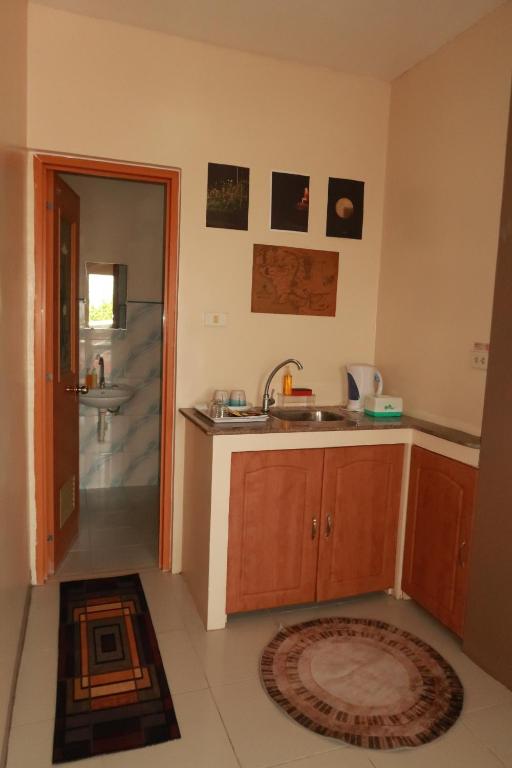 Kuchyň nebo kuchyňský kout v ubytování Jo-Cris Apartelle