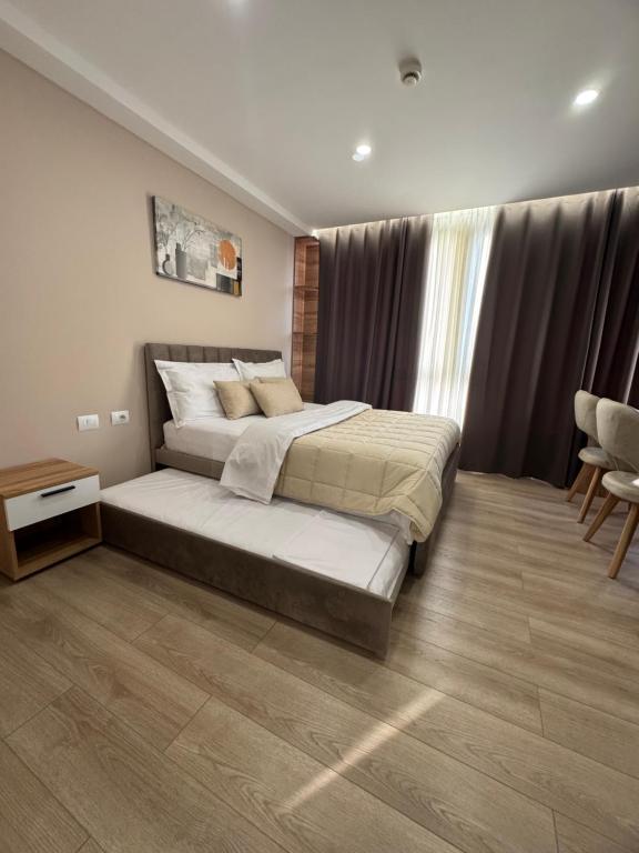Postel nebo postele na pokoji v ubytování RoRa Studio Apartments