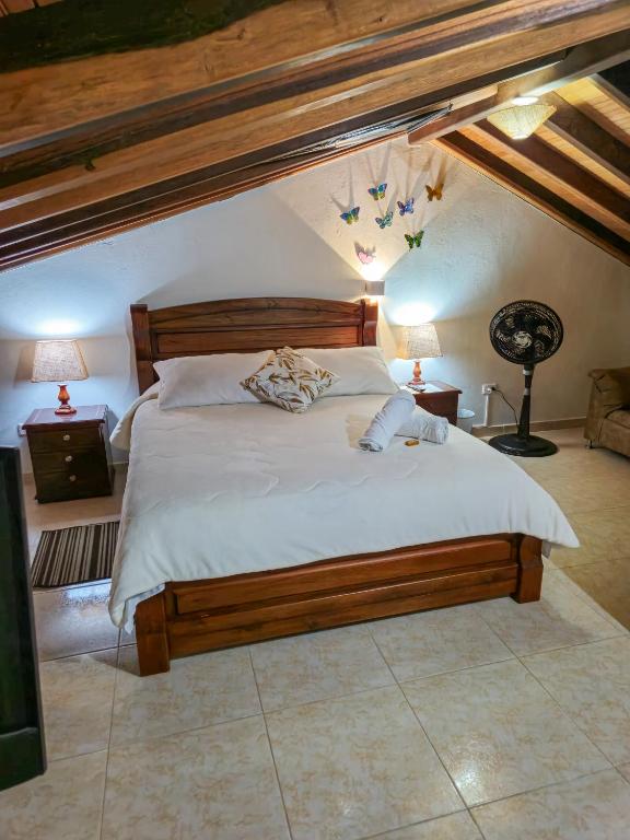 Postel nebo postele na pokoji v ubytování Apartahotel saquenzipá